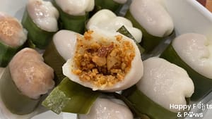 Glutinous Rice Balls with nuts inside wrapped with banana leaves
