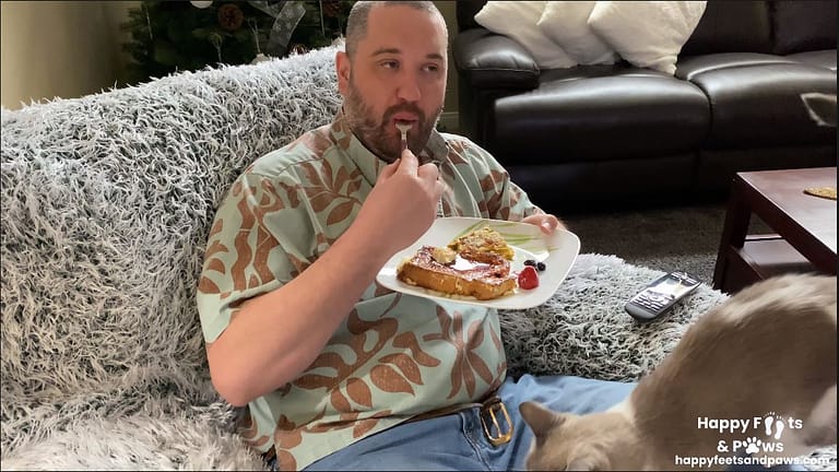 man eating french toast