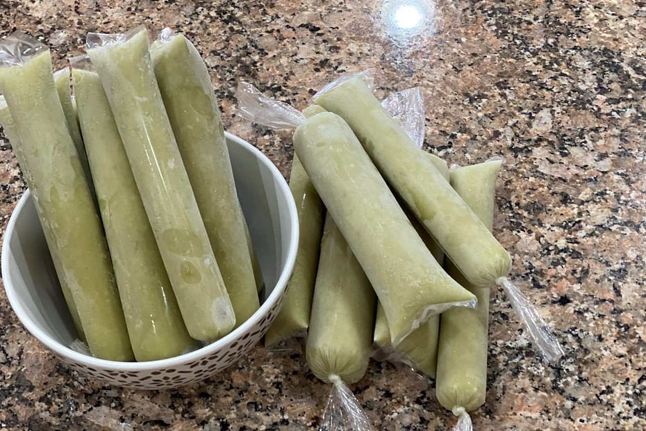 filipino avocado ice candy in wrapper with bowl