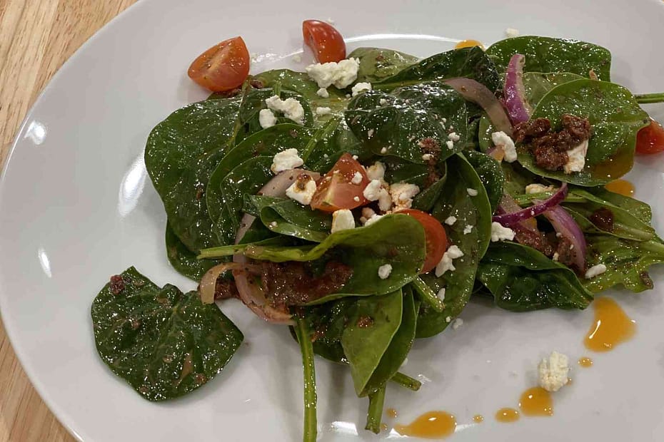 Spinach Salad with feta cheese on a plate