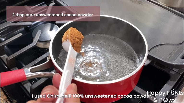 Adding cocoa for sikwate recipe