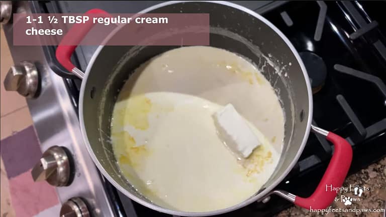fettuccine alfredo sauce being cooked