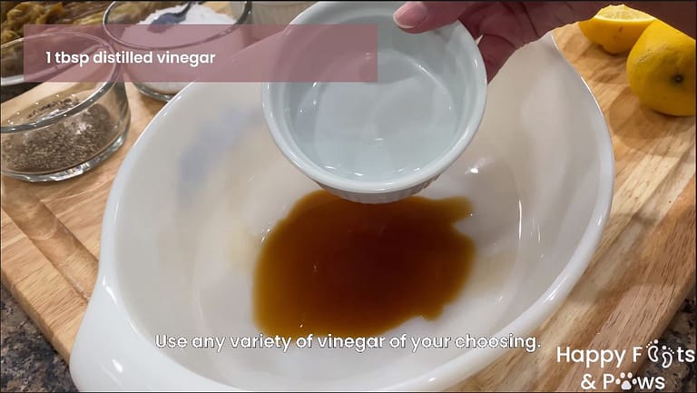 adding distilled vinegar to filipino grilled eggplant salad