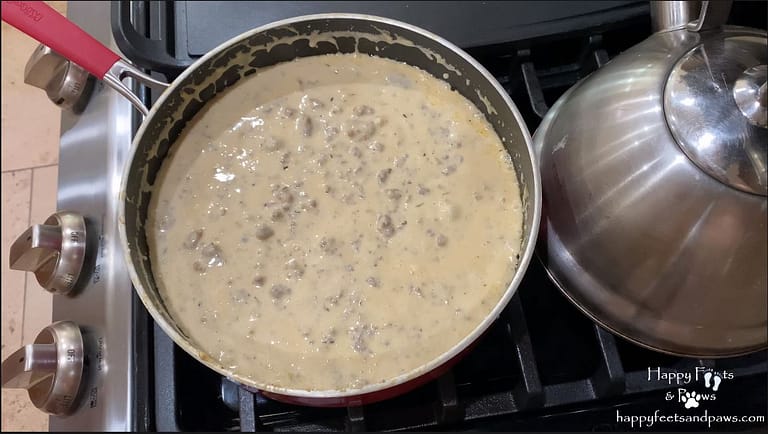 sausage gravy in pot on stove cooking