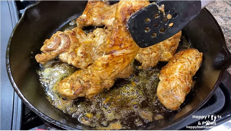 cooking chicken in iron skillet for chicken fajitas recipe