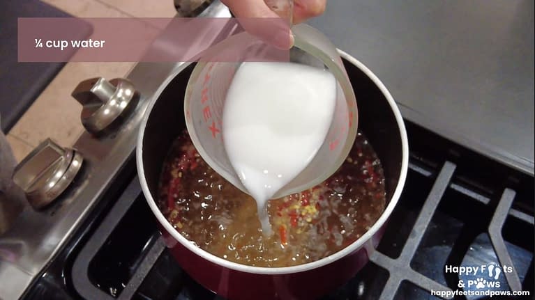 corn flour being added to pot for sweet chili sauce