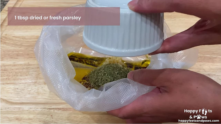 adding ingredients to vacuum seal bag for marinade mix