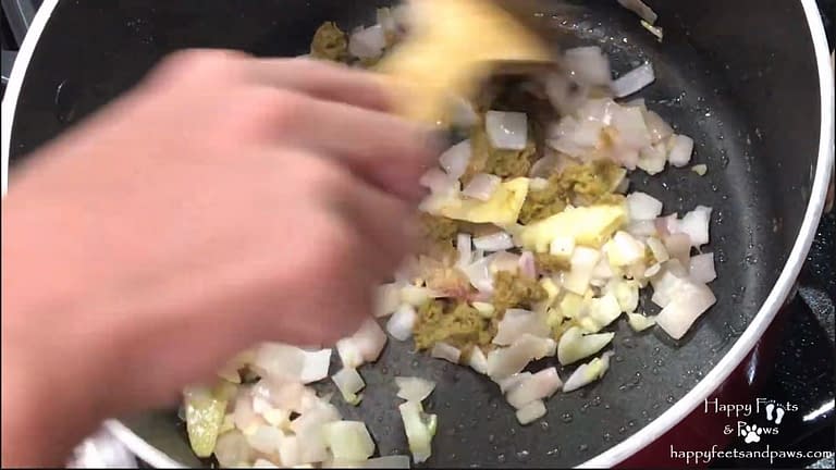 Ingredients being sauteed in a pot