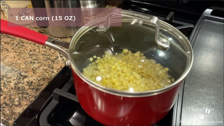 cooking corn on the stove in a pot