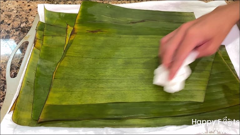 cleaning banana leaves for puto maya recipe