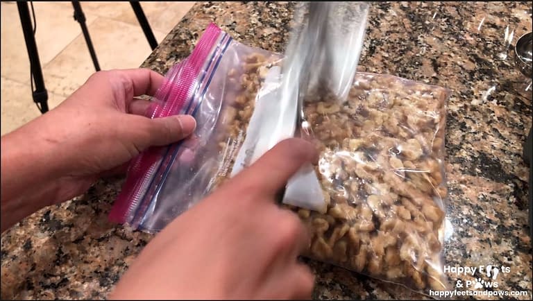 crushing walnuts in a ziplock bag