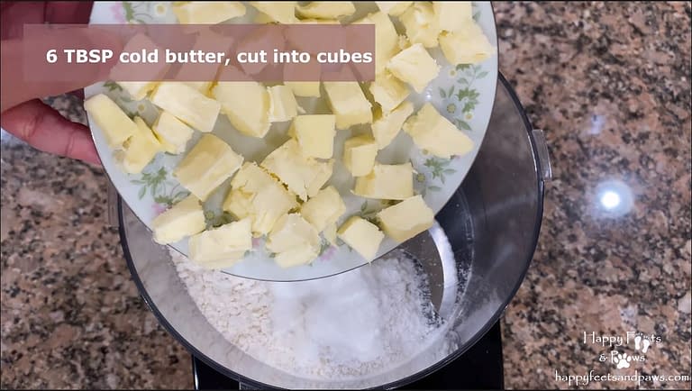 butter being added to flour for biscuits and gravy recipe